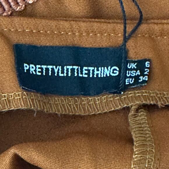 NWT PrettyLittleThing Burnt Orange Tassel Hem Mini Skirt Womens 2 Boho Western - Picture 7 of 8